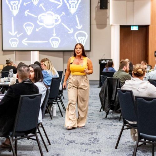 Rachel Carey speaking at her Masterclass NDIS conference and networking event